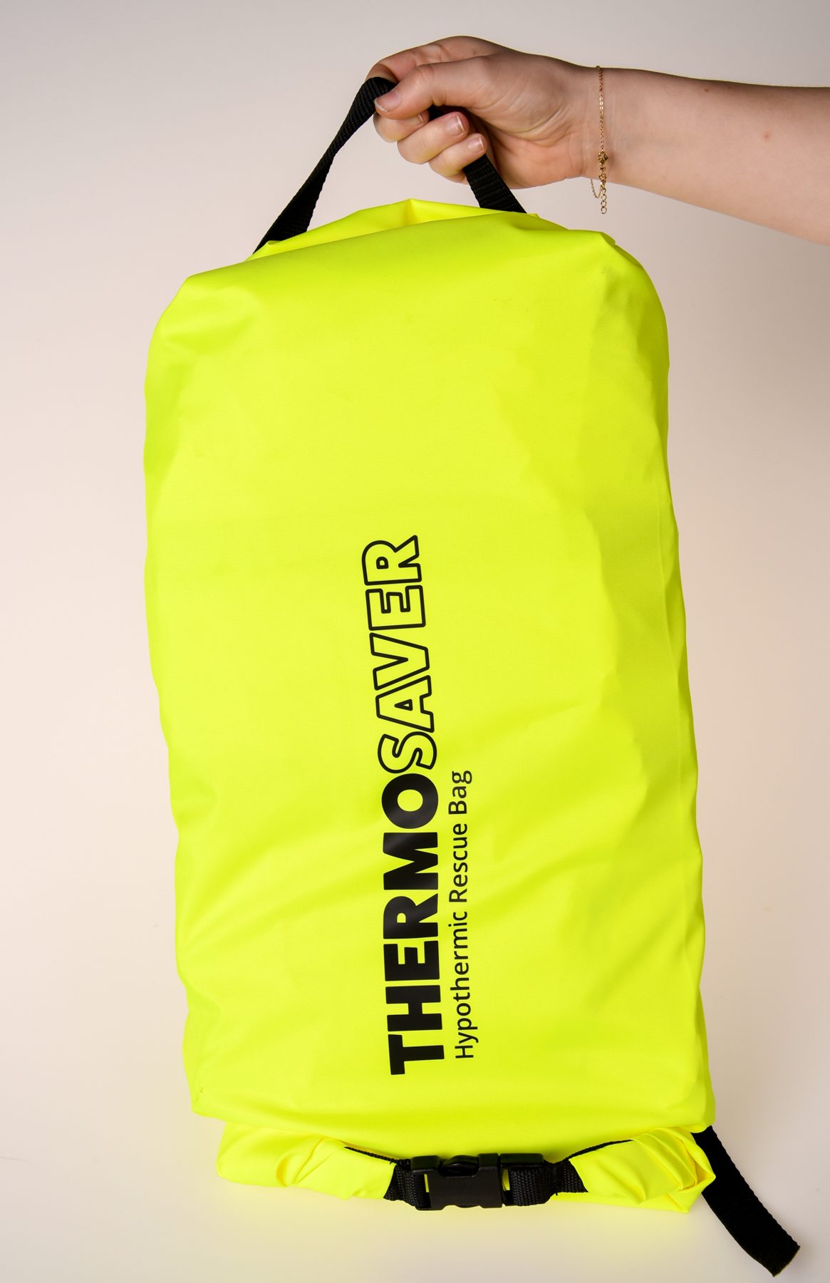 Packed Thermosaver rescue bag carried by its top handle